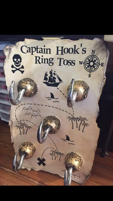 Captain Hooks ring toss Birthday Party Ideas Decoration, Party Ideas Decoration, Pirate Halloween Party, Mermaid Pirate Party, Pirate Themed Birthday Party, Caribbean Party, Peter Pan Party, Pirate Themed Birthday, Pirate Games