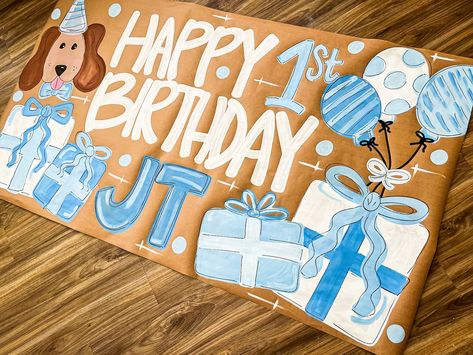 The cutest birthday banner 🤩🐶💙 #banner #birthday #art #artwork #banners #brownpaperbanner Painted Banners, Twins 1st Birthdays, Birthday Art, Banner Ideas, Banner Birthday, Paper Banners, Event Banner, Happy 1st Birthdays, Brown Paper