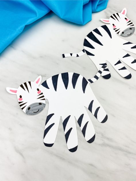 If you're looking for a fun and easy wild animal craft for kids, this handprint zebra craft is perfect! Download the free printable template and make with toddlers, preschool and kindergarten children at home or in the classroom.#simpleeverydaymom #handprintcrafts #wildanimalcrafts #animalcrafts #zebracrafts #kidscrafts #craftsforkids Zebra Craft, Jungle Crafts, Zoo Animal Crafts, Pig Crafts, Zebra Art, Alphabet Crafts, Animal Crafts For Kids, Handprint Crafts, Craft For Kids