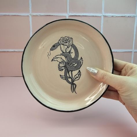 Whether you're a snake enthusiast, a lover of unique décor, or someone who appreciates handmade craftsmanship, this handmade ceramic snake dish is sure to make a statement in your home. Pink Handmade Jewelry, Ceramic Snake, Snake Flower, Jewellery Dish, Small Trinkets, Stoneware Dishes, Snake Design, Pottery Plates, A Snake