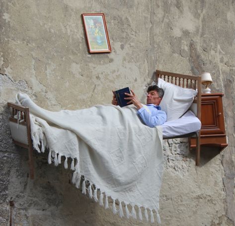 Artist Thierry Mandon Lives in Suspended Domestic Scenes Within the Ghost Rooms of Severed Buildings | Colossal Colossal Art, Reading In Bed, Inside Outside, Everyday Activities, Abandoned Buildings, Diy Canvas Art, Magazine Art, Diy Canvas, French Artists