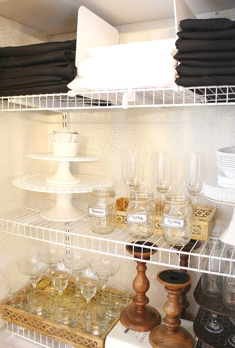 Transform a rarely used coat closet into an entertaining closet. It is the perfect place for storage of cake stands, trays, candle sticks and glassware. Having everything at your fingertips makes entertaining a breeze and there is still room for storing your guests coats! Entertaining Closet Organization, Party Supplies Storage Ideas, Hosting Closet, Entertaining Closet, Party Supply Organization, Coastal Dinnerware, Shower Cleaning Hacks, Ideas For Kitchen, Kitchen Organization Diy