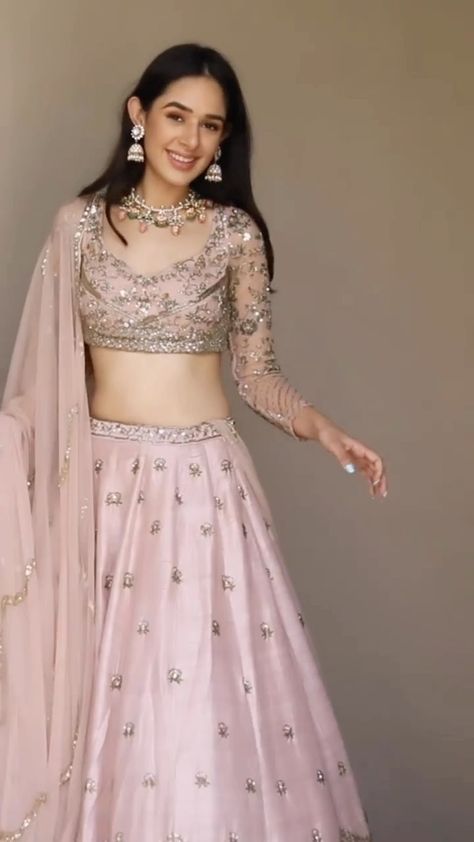 WeddingBazaar Fashion | Engagement or Sangeet - when would you wear this gorgeous pink lehenga 💕 . . Outfit @asthanarangofficial . . .✨ 𝐏.𝐒. 𝐖𝐞 𝐝𝐨𝐧’𝐭 𝐒𝐞𝐥𝐥… | Instagram Sangeet Lehenga Designs For Bride, Blouse Design For Lehenga Wedding, Lehnga Designs Pastel Colours, One Sleeve Lehenga, Bridesmaid Lehenga Look, Party Wear Lehenga Blouse Designs, Best Lehenga Design, Latest Lehenga Blouse Designs Wedding, Blouse Designs Lengha Latest