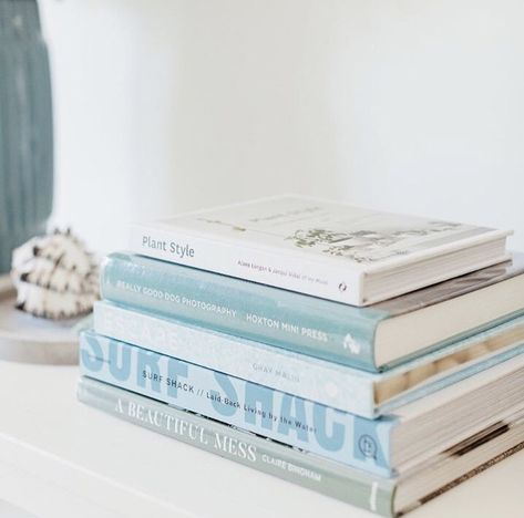 Beach Coffee Table Books, Surf Shack Book, Coastal Desk Ideas, Coastal Coffee Table Books, Beachy Shelf Decor, Coastal Granddaughter Desk, Coastal Books, Beachy Desk, Beachy Office