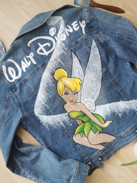 Painted Jacket Denim, Disney Jean Jacket Diy, Hand Painted Jean Jacket, Painted Jeans Disney, Painted Jean Jacket Ideas Disney, Disney Jean Jacket, Painted Disney Jacket, Disney Blue Jean Jacket, Disney Denim Jacket