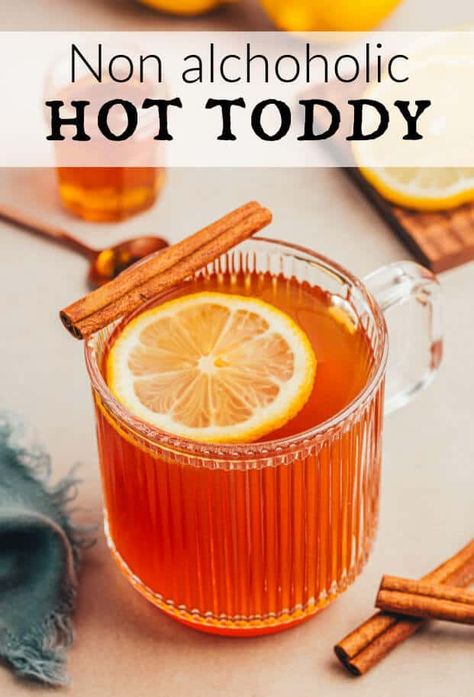 Looking for a cozy winter drink? This Non-Alcoholic Hot Toddy is packed with warming spices, fresh ginger, and honey for a delicious and wholesome treat! Perfect for sipping by the fire. Save this recipe now! Virgin Hot Toddy Recipe, Virgin Hot Toddy, Alcohol Free Hot Toddy, Non Alcoholic Hot Toddy, Hot Toddy Recipe For Colds, Hot Toddy Recipe, Toddy Recipe, Tulsi Tea, Hot Toddies Recipe