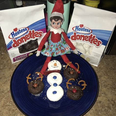 Elf on the shelf ideas, chippy the elf, reindeer and snowman donuts, move the elf, girl elf, donettes Donuts From Elf On The Shelf, Elf On Shelf Donut Ideas, Christmas Funnies, Snowman Donuts, Elf Notes, Elf Reindeer, Elf Shelf, Awesome Elf On The Shelf Ideas, Elf Girl