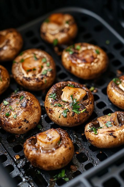 Grilled mushrooms topped with garlic and herbs in a black basket. Mushroom In Airfryer, Airfryer Mushroom Recipes, Healthy Food Air Fryer, Fall Air Fryer Recipes, Mushroom Air Fryer Recipes, Air Fryer Snacks Easy, Air Fry Mushrooms, Airfryer Mushrooms, Air Fryer Mushrooms Recipe