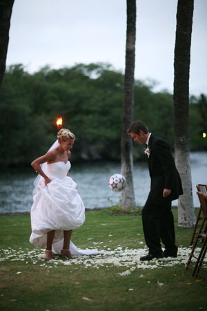 1. A fun and unusual photo of the couple that captures the theme of their wedding. 2. Natural light at almost dusk. 3. Possibly fill flash used. 4. Trees in the background could have easily grown out of one of their heads - but don't. 5. Assume this was a somewhat staged photo. 6. Somewhat shallow depth of field; background out of focus. 7. Wish the chairs were not on the right. Soccer Celebrations, Olympic Women, Soccer Wedding, Soccer Couples, Football Wedding, Handsome Husband, Soccer Theme, Soccer Star, Funny Wedding Photos