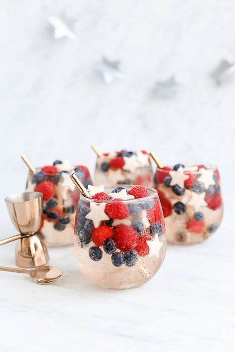 If you're hosting a 4th of July bash, our Star-Spangled Spritzer belongs on your guest list! This tasty cocktail will wow with its festive presentation! Barbecue Dinner, 4th Of July Cocktails, Star Shaped Cookies, 4th Of July Desserts, Holiday Goodies, Fourth Of July Food, Fourth Of July Decor, July 1st, 4th Of July Celebration