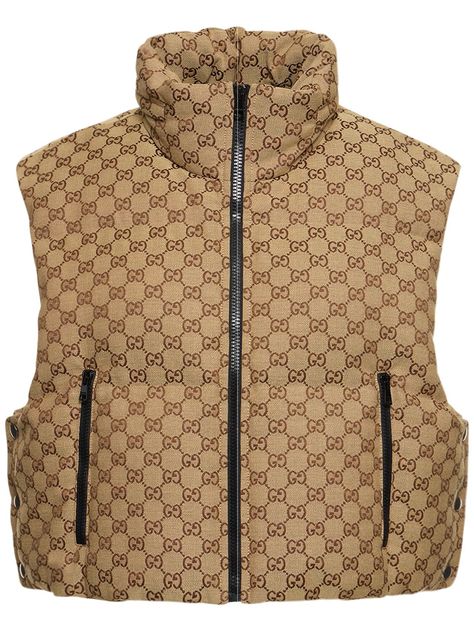 Find Gucci Gg Canvas Down Vest on Editorialist. High collar with concealed hood. Front zip closure. Logo details. Sleeveless. Two side zip pockets. Padded . Lined. Model is wearing a sizeS Shoe Storage Hacks, Canvas Vest, Shoe Storage Solutions, Versace Brand, Ski Accessories, Walk In Wardrobe, Jackson Hole, Down Vest, Flat Espadrilles