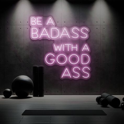 Illuminate your space with a splash of motivation and humor with our "Be a Badass with a Good Ass" neon sign. This vibrant piece is not just a light source; it's a statement of empowerment and a nod to those who work hard to feel strong and confident. Perfect for home gyms, fitness centers, or any space where motivation meets a bit of cheeky humor. Key Features: Bright and Vibrant: Crafted with high-quality LED neon tubing, this sign emits a warm, captivating glow that energizes any room. Durable and Energy-Efficient: Our neon signs are designed to last, offering long-term durability without consuming excessive energy. Easy to Install: Comes with a simple mounting kit, allowing you to illuminate your space in minutes. Customizable Options: Available in various colors to match your style or Gym Led Sign, Rental Remodel, Girlie Quote, Gym Signs, Industrial Signage, Home Gyms, Fitness Aesthetic, Daily Positive Affirmations, Neon Light Signs