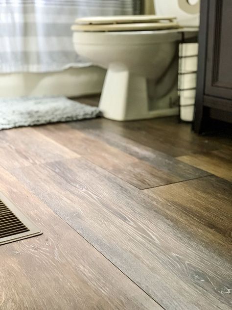 Lifeproof Burnt Oak Vinyl Flooring, Lifeproof Bathroom Floor, Lifeproof Moose Lake Chestnut Flooring, Lifeproof Heirloom Pine Vinyl Flooring, Waterproof Kitchen Flooring, Lvf In Bathroom, Life Proof Dusk Cherry Vinyl Flooring, Lvp Bathroom Floors, Lifeproof Vinyl Flooring Colors