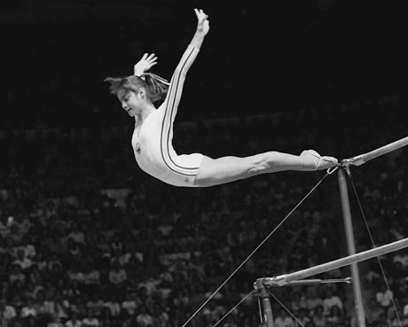 Nadia Comaneci: 1976 Montreal Olympics scores perfect 10 for the first time in history Nadia Comaneci Perfect 10, 1976 Olympics, Gymnastics Events, Nadia Comaneci, Uneven Bars, Gymnastics Photos, Olympic Gymnastics, Balance Beam, Artistic Gymnastics