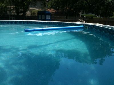 I have an above ground pool and keeping it clean is often difficult because there are trees hanging over it as you can see by the shade in the picture.  I have the pump nozzle set to make the water… Backyard Landscaping Pool, Skimmer Pool, Pool Skimmers, Landscaping Pool, Swimming Pool Maintenance, Pool Shade, Pool Hacks, Pool Skimmer, Intex Pool