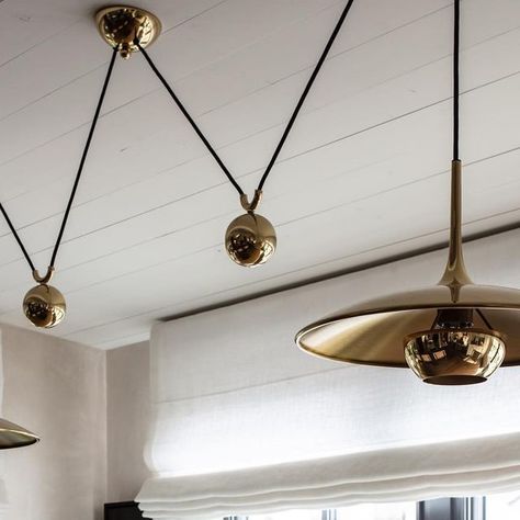 Studio Gutow on Instagram: "We love lighting that feels like artwork - especially this Florian Schulz brass fixture that perfectly elevates our client’s banquette dining nook. 

Photography
@michaelcliffordphotography 

Styling
@rowelosangeles 

#interiordesign #design #interior #homedecor #architecture #home #decor #interiors #inspiration #lightingdesign #lightinginspo"