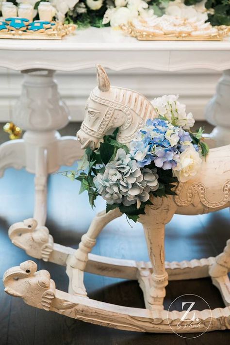 rocking-horse-with-blue-hydrangea #babyshowerideas4u #birthdayparty #babyshowerdecorations #bridalshower #bridalshowerideas #babyshowergames #bridalshowergame #bridalshowerfavors #bridalshowercakes #babyshowerfavors #babyshowercakes Prince Baby Shower Ideas, Royalty Baby Shower, Horse Baby Shower, Carnival Baby Showers, Girl Shower Themes, Classy Baby Shower, Shower Balloons, Cowboy Baby Shower, Baby Shower Theme Decorations