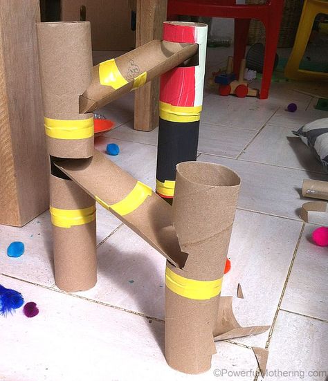 diy marble runs+cardboard | For the base I used a side of a cardboard box, marked the towers out ... Diy Marble Run, Toilet Roll Craft, Diy Marble, Marble Run, Easy Toddler, Paper Roll Crafts, Diy Crafts For Kids Easy, Paper Towel Roll Crafts, Cardboard Tubes