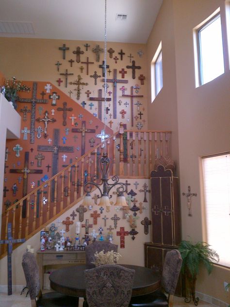 I have always wanted a wall of crosses, but I think this takes it a bit too far.  I would begin to feel like Linda Blair. Wall Of Crosses, Hand Painted Crosses, Linda Blair, Catholic Decor, Mexican Wall, Perspective Drawing Architecture, Cross Crafts, Mexican Home, Cross Wall