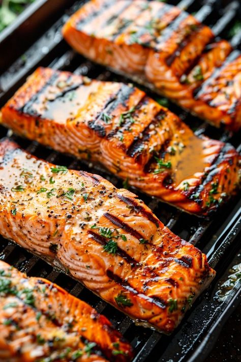 Discover the perfect summer meal with this flavorful grilled salmon on the grill in foil recipe. This easy and delicious dish is great for outdoor BBQs or weeknight dinners. Pair it with a fresh grilled salad recipe for a complete and healthy meal. The foil packet cooking method ensures juicy and perfectly cooked salmon every time. Elevate your grilling game with this simple yet impressive recipe that will surely become a favorite in your household. Grilled Salad Recipes, Salmon On The Grill, Easy Grilled Salmon, Salmon In Foil Recipes, Cooked Salmon, Grilled Salad, Salmon In Foil, Salad Inspiration, Foil Packet