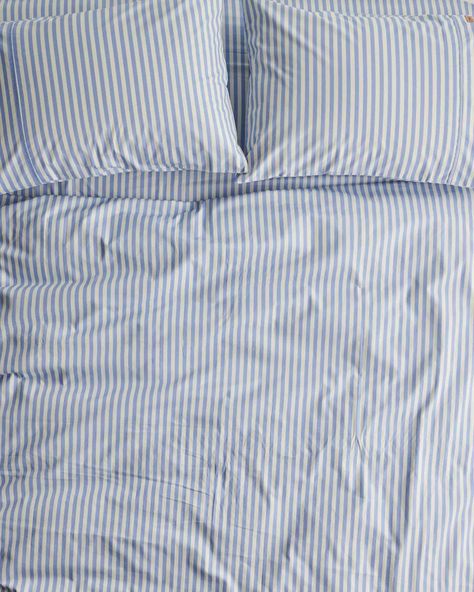 A simple vertical blue and white stripe pattern, Seaside Stripe is the perfect all-rounder print. This certified organic cotton range is available in a variety of bright and beautiful patterns and prints. Both bold and versatile our quilt covers can be mixed and matched with an endless selection of colours and prints, across all ongoing seasonal releases. This quilt cover is printed on both sides. Suitable to be styled with Check 1-2 White and Black. Surfing Bedroom, Decorating My Room, Bed Layout, Wallpaper Door, Timeless Color Palette, Camp House, Apartment In New York, Cozy Weekend, Kids Pillow Cases