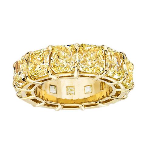 Fancy Yellow Radiant Cut Eternity Band | From a unique collection of vintage wedding rings at http://www.1stdibs.com/jewelry/rings/wedding-rings/ Diamond Band Rings, Vintage Wedding Rings, Sapphire And Diamond Band, Yellow Diamond Engagement Ring, Emerald Cut Diamond Ring, Fancy Yellow Diamond, Yellow Jewelry, Sapphire Band, Wedding Rings Vintage