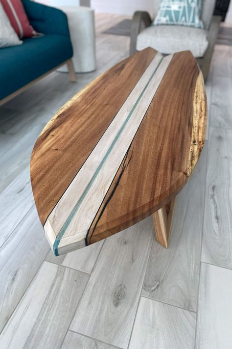 A retro surfboard crafted from teak and monkeypod. It was finished with Rubio Monocoat hardwax oils and water-based wood stain. Retro Surfboard, Surfboard Table, Surfboard Coffee Table, Wooden Surfboard, Rubio Monocoat, Backyard Bar, Woodworking Joinery, Costa Rican, Natural Wood Finish