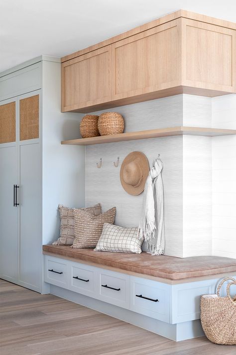 Coastal style mudroom with pale blue cabinetry, upholstered seat cushions and timber cupboards overhead. Beach House Mud Room, Gold Coast Apartment, Coastal Foyer, Farming Couple, Seating Nook, Coastal Style Kitchen, Home Drawing, Mud Room Entry, Mudroom Decor