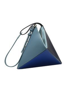 Triangle bag designs are a modern and stylish take on traditional bag shapes, offering a unique and fashionable twist on everyday accessories. These bags, inspired by the geometric triangle, are known for their sharp, angular silhouettes and distinctive structures. Unlike round or rectangular bags, triangle bags have a bold, contemporary appeal that sets them apart in the fashion world. Their shape can vary in size, from small, chic clutches to larger, more functional shoulder or crossbody bags. Bag Shapes, Triangle Bag, Bag Designs, Geometric Triangle, Everyday Accessories, Fashion World, Clutches, Crossbody Bags, Bags Designer