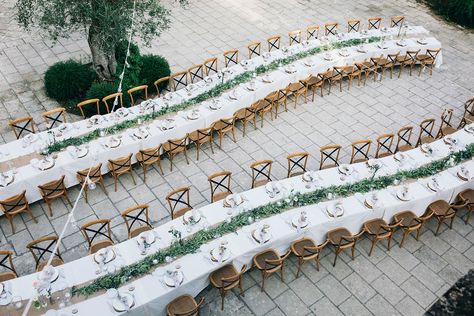 Outdoor Wedding Reception Decor at Tenuta Tresca | Long Tables Snaking Through Courtyard | Foliage Table Runners | Festoon Lights | Knotted Lilac Napkins | Tall Stemmed Candle Holders | Puglian Countryside Wedding with Fairy Light Altar and Olive Grove Aperitivo | Figtree Wedding Photography Outdoor Wedding Reception Decor, Snake Table, Outdoor Wedding Reception Decorations, Stemmed Candle Holders, Anna Kara, The Paper Kites, Rock My Style, Moon Gate, Countryside Wedding