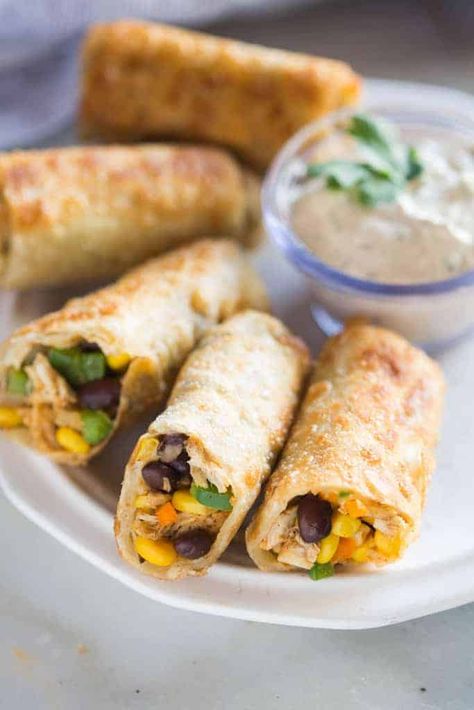 Crispy Southwest Egg Rolls (that you can bake or fry!) served with a creamy cilantro dipping sauce. These could be my favorite party appetizer of all time, (and they're freezer friendly)! Southwest Eggrolls, Raspberry Freezer Jam, Southwest Egg Rolls, Favorite Party Appetizers, Chicken Egg Rolls, Chicken Spring Rolls, Tastes Better From Scratch, Cilantro Sauce, Egg Roll Recipes