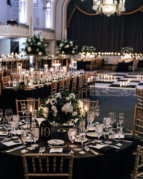 A Midnight Kiss at a Boston New Year’s Eve Wedding✨ Alie and Zach’s winter wedding theme of elegant, moody, classic glam was beautifully brought to life by @bameventsbos. The sophisticated color palette, enriched with gold accents and abundant candlelight, perfectly matched their vision. The photos by @cityluxstudios not only captured the couple’s happiness and the venue’s grandeur but also added a timeless elegance with black-and-white images that embodied the glam of their New Year’s Eve c... Black And White Color Scheme Wedding, Winter Wedding Glam, Black Wedding Esthetics, Black Tie New Years Eve Wedding, New Years Day Wedding Ideas, Classy Black And White Wedding Decor, Silver And Gold Winter Wedding, Black And White Ballroom Wedding, White Black And Gold Wedding Theme