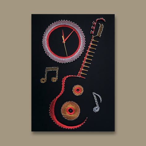 Handcrafted string art wall clock featuring a guitar design, blending music and time with intricate thread work on a wooden canvas, perfect for adding a unique touch to your home decor." Geometric Guitar, Black Leather Background, Wall Art Ideas Diy, Unique Wall Art Ideas, Leather Background, Wall Clock Black, Art Guitar, Wall Decor Minimalist, Modern Rustic Decor