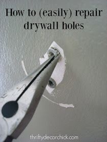 How to Easily Patch Holes in Drywall from Thrifty Decor Chick Repair Drywall Hole, Fill Nail Holes, Thrifty Decor Chick, Drywall Repair, Mason Jar Lighting, Diy Home Repair, Nail Holes, Mason Jar Diy, Home Repairs