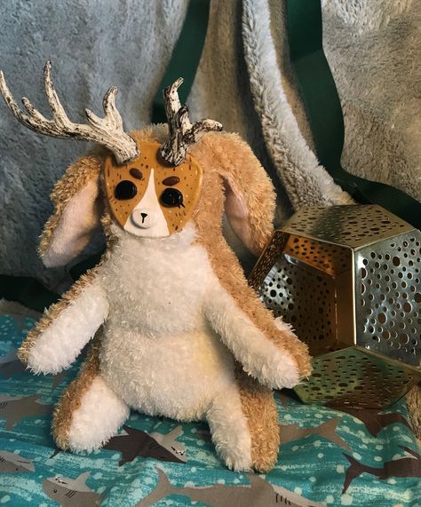 Their face is made of airdry clay and coated in varnish to protect the painted details. Clay Face Stuffed Animal, Jackalope Plush, Clay Face, Clay Faces, Miniature Art, Collectible Dolls, Stuffed Animal, Art Dolls, Figurines