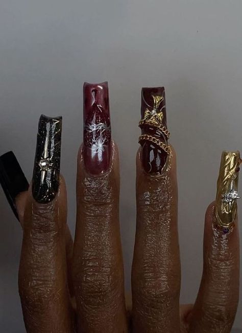 Baddie Nails Extra: Long acrylic nails in black, gold, nude, and red. Red Gothic Nails, Red Black And Gold Nails, Extra Baddie Nails, Extra Long Acrylic Nails, Nails Red And Gold, Nails In Black, Extra Nails, Red And White Nails, Gold Acrylic Nails