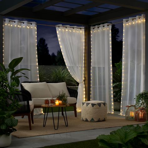 PRICES MAY VARY. Polyester Create a Magical Ambiance: Light up your space with a splash of whimsy and magical fun. The Eclipse Starlight Curtain Lights Panel can be hung as traditional curtain panel on your window, as a room divider and even in your outdoor patio area Curtain String Lights For A Warm Glow: Our sheer voile curtain panel gently filters the light. White lights frame the border of the light curtain panel and are operated through a remote control. The sweet and petite lights cast a w Roman Shades French Doors, Pet Sofa Cover, Fairy Light Curtain, Hookless Shower Curtain, Cordless Roller Shade, Curtain Room Divider, Traditional Curtains, Outdoor Curtains For Patio, Porch Curtains