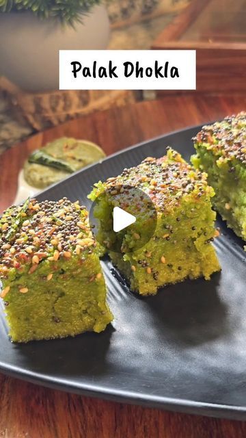 Kanak Gurnani on Instagram: "Healthy Breakfast /Snack
Palak Dhokla Recipe 

Ingredients 
➡️ For Dhokla
Spinach 1.5 Cups
Suji 1 Cup
Dahi 1 Cup
Salt to taste 
Green Chilli 1
Ginger 1/2 Inch
Eno Fruit Salt 1 Sachet 
Red Chilli 1tsp
➡️ For Tadka
Oil 2tbsp
Mustard Seeds 1tbsp
Jeera 1/2 tsp
Sesame Seeds 1tbsp
Curry Leaves 10
Green Chilli 2
Steps
➡️ In a blending jar add balanced spinach along with suji, green chilli , ginger & Curd. 
➡️ Transfer the Puree in a mixing bowl. 
➡️ Rest the batter 30 mins.
➡️ Add salt and mix it well.
➡️ Keep the steamer ready. Add eno and give it a quick mix. Immediately transfer to the plate or tin and steam for 25 mins on low to medium flame.
➡️ Let it cool for 10 mins. Then add tadka and serve with your fav Chutney or dip.

Love ❤️ #kanak_gurnani 

#dhokla #spina Palak Breakfast Recipes, Healthy Breakfast Snacks, Dhokla Recipe, Veg Snacks, Peacock Painting, Mustard Seeds, Green Chilli, Breakfast Snacks, Recipe Ingredients