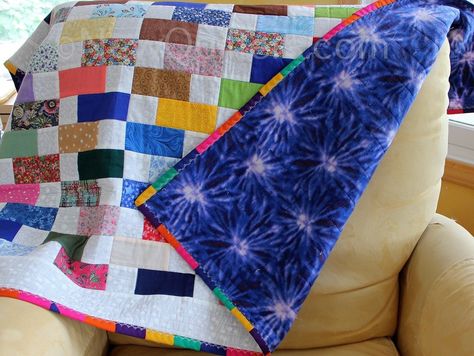 Can you back a quilt with polyester fleece instead of the usual batting and cotton backing layers? Yes! The result is warm, light, tough, and easy to wash. Learn how to quilt with fleece in the tutorial from NewQuilters.com. #fleecequiltbacking, #quiltbacking Tshirt Quilt Backing Ideas, Backing A Quilt, Tee Shirt Quilt, Fleece Quilt, Quilt Layers, Basic Quilt, Tie Blankets, Flannel Quilts, Sewing Fleece