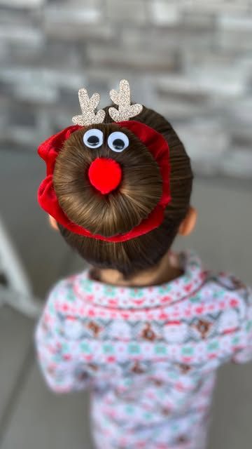 Tiffany Snedaker ❤️ Hairstyles for Girls on Instagram: "Rudolph the red nosed reindeer bun!  This was so cute and easy to do today. Best of all, I have a kit for you to make your own reindeer bun. Head over to our website to get yours!" Reindeer Hairstyles For Kids, Rudolph Hair Bun, Holiday Kids Hairstyles, Christmas Hair Toddler Girl, Mrs Claus Hairstyle, Snowman Hairstyles For Kids, Kids Christmas Hairstyles Fun, Christmas Girl Hairstyles, Christmas Hairstyles For Toddlers