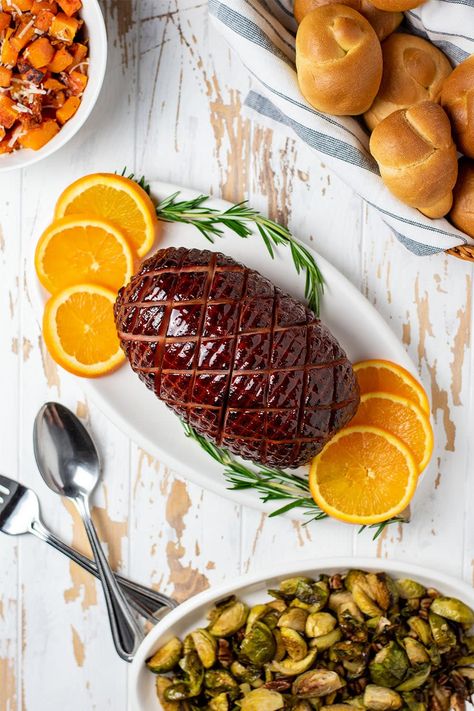 Baked Boneless 3-pound Hatfield dinner ham. This honey bourbon baked ham recipe is made with a honey, orange, brown sugar, and bourbon glaze, it’s sweet, citrusy, and perfect for holidays, parties, or celebration meals. Baked for 1 hour and juicy and tender. #bakedham #hatfieldham #ad #sponsored Honey Bourbon Ham Glaze, Bourbon Ham Glaze, Celebration Meals, Bourbon Ham, Ham Cooking Time, Dinner Ham, Baked Ham Recipe, Ham Recipes Baked, Honey Bourbon