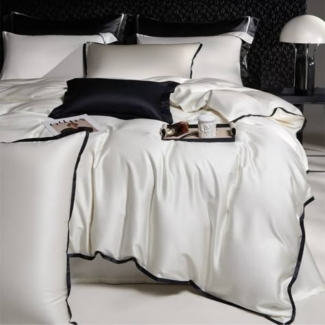 🥳Experience the epitome of luxury with our Italian haute couture 800TC ultra-fine dual-strand Tencel bedding set.This collection exudes a sophisticated Chanel-inspired elegance, perfect for infusing your summer nights with a romantic ambiance. The primary hues are carefully chosen for their clear and natural tones, breaking the monotony of solid colors and creating a serene yet elegant home atmosphere.🥳 Indulge in the ultimate comfort and style with this exquisite bedding set, designed to ele... Luxury Modern Bedding, Bedding Ideas 2025, Luxurious Bedding Ideas, Ultra Luxury Bedroom, Luxury Bed Set, Black White Bedding, Bedding Set Ideas, Tencel Bedding, Solid Bedding