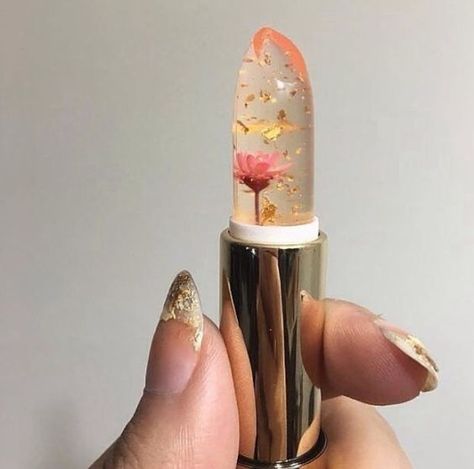 Clear lipstick with gold flakes and a flower inside Clear Lipstick, Flower Lipstick, Jelly Flower, Jelly Lipstick, Ios Wallpapers, Music Fashion, Diy Style, Beautiful Makeup, Makeup Nails