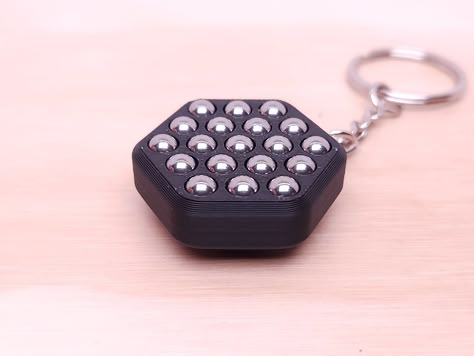 A keychain Worrystone fidget toy designed for relaxation, offering a delightful sensory experience. This fidget has large rollers on one side and smaller rollers on the other side. Dimensions are 45mm in diameter and 13mm in thickness or 1 in diameter and 0.5in thickness DISCLAIMER: Small children should not be allowed near magnets as they are dangerous if swallowed. Small magnets can be a choking hazard and should never be swallowed or inserted into any body part as they may cause internal dama Weird Obsessions, Stim Toys, Figet Toys, Lego Education, Bday Gifts, Brain Food, Summer Plans, Sensory Experience, At Home Workout Plan