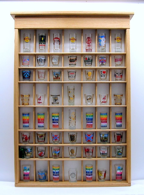 Short Glass Cabinet, Shot Glass Display Ideas, Diy Shot Glass Display, Shot Glass Display, Shot Glasses Display, Shot Glass Holder, Souvenir Display, Quirky Kitchen, Short Glass