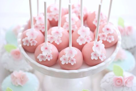 Cherry blossoms cakepops...For tutorials and more follow my Instagram account @sosweetbites Cherry Blossom Treat Table, Cherry Blossom Candy Table, Cherry Blossom Strawberries, Wedding Ideas Cherry Blossoms, Cherry Blossom Cake Pops, Quinceanera Cherry Blossom Theme, Wedding Cherry Blossom Theme, Cherry Blossom First Birthday, Cherry Blossom Treats