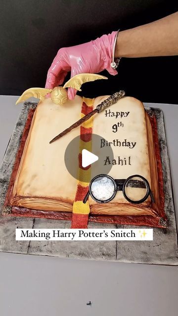 Dayeeta Pal | Hyper-realistic Cake Artist | Illusion Cakes on Instagram: "Making Harry Potter’s Snitch ✨  Adding a florist gauge wire under the wings of the golden snitch is a very helpful ✅  It works brilliantly as a backbone for the wings ✅  You don’t have to wait for the wings to dry as the wire gives it the support it needs.  You can bend and shape the wings however you like😊  ✅ Materials used Modelling paste @thesugarpaste  Florist gauge wire @squireskitchen  Antique gold dust @sugarflaircoloursltd mixed with rejuvinator @sugarflaircoloursltd   Follow for easy cake decorating tips and realistic cakes ✅  . .  ✅ For more amazing content follow me on YouTube - https://youtube.com/@diyacakesit4016  ✅ For Workshops & Collaborations WhatsApp / +44 7920 486924 . . . #waferpaper #waferpapera Harry Potter Birthday Cake Easy, Easy Harry Potter Cake, Harry Potter Cakes Birthday, Harry Potter Cake Decorations, Harry Potter Cake Ideas, Harry Potter Book Cake, Harry Potter Cakes, Open Book Cakes, Illusion Cakes