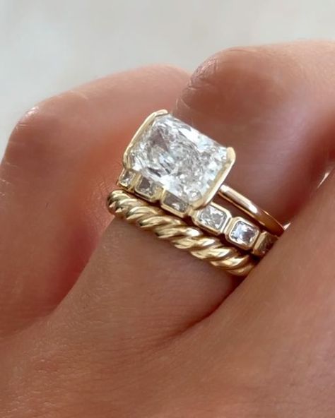 GOODSTONE on Instagram: "Swipe to get an up-close look at this stack featuring our Baby Bezel Band with East West Radiant Cuts. ✨ Obsessed is an understatement.  Want this look? Shop the link in our bio to get our new most popular wedding band. 💍  #engagementring #engagementrings #radiantcut #radiantcutdiamond #weddingrings #ringstack" Radiant Cut Wedding Stack, East West Wedding Band, East West Ring Stack, East West Engagement Ring Stack, East West Radiant Engagement Ring, Radiant Wedding Band, Wedding Ring Stack Ideas, Bezel Wedding Band, Radiant Wedding Rings