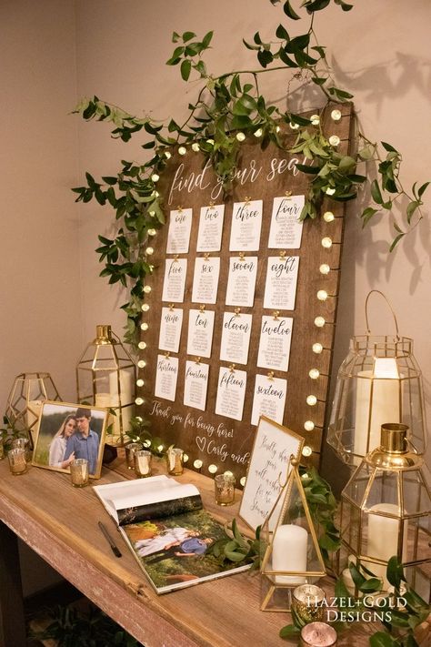 Find all the details on how to make this gorgeous rustic seating chart with lights! Help the wedding go off without a hitch using this organized seating chart for all the guests to see. Use stringed bubble lights to add sparkle and beauty to your wedding decor. #weddingdecor #rusticwedding #seatingchart #woodendecor #seatingchartwithlights #bubblelights #rusticweddingdecor Simple Wedding Seating Chart Ideas, Rustic Seating Chart Wedding, Pallet Wedding Decor, Rustic Wedding Seating Chart, Rustic Seating Charts, Diy Rustic Wedding, Seating Chart Wedding Diy, Rustic Wedding Seating, Diy Seating