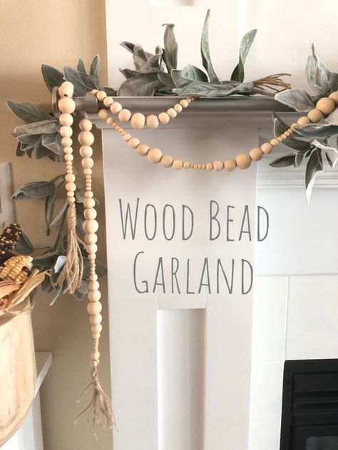 Wood Bead Garland Wedding Decor, Wood Bead Garland Mantel, Wooden Beads On Mantle, Wood Garland Decor Ideas, Wood Bead Christmas Garland, Wooden Bead Garland Decor Ideas, Wood Bead Garland Decor Ideas, Wood Bead Garland Styling, Boho Mantle Decor